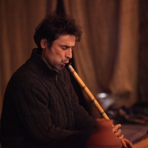 Playing ney (Turkish reeed flute)